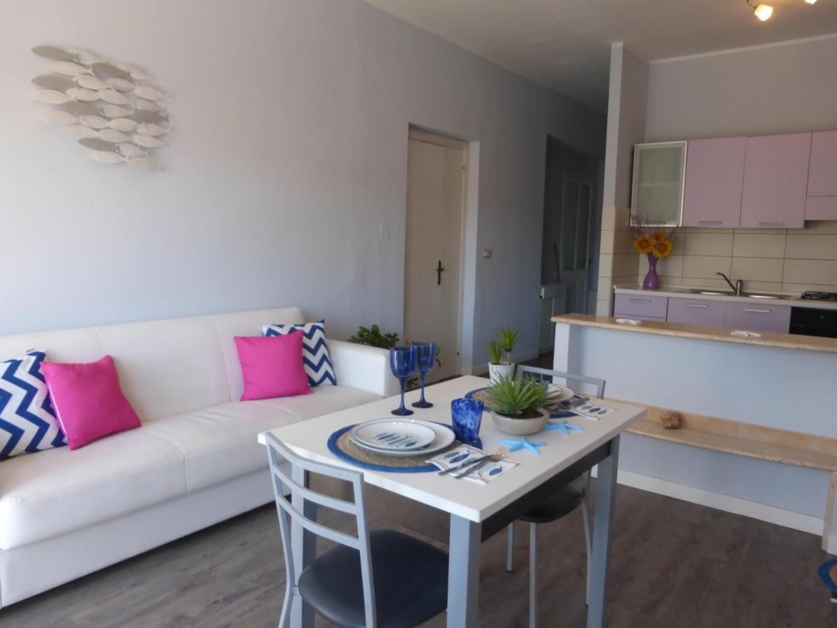L'Acquario Apartment Cala Gonone Bagian luar foto