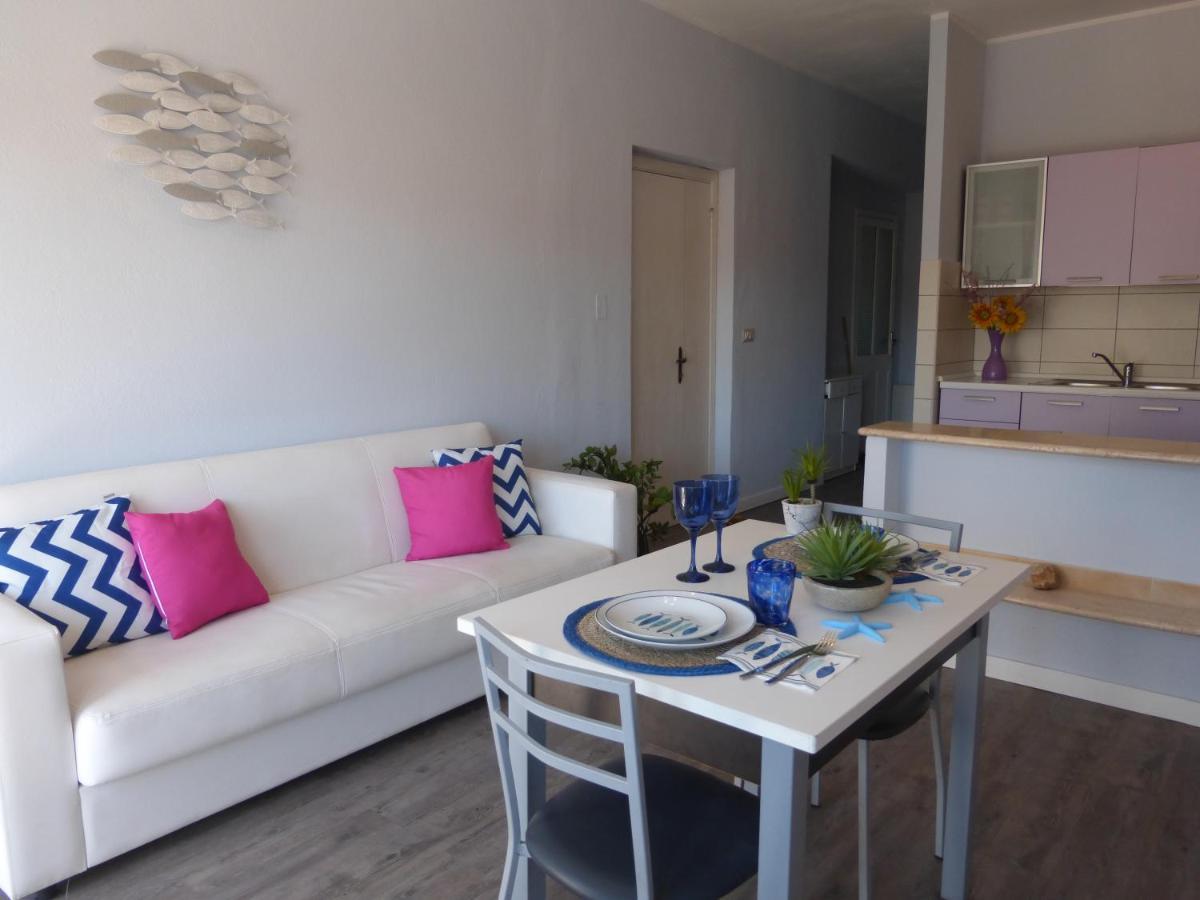 L'Acquario Apartment Cala Gonone Bagian luar foto