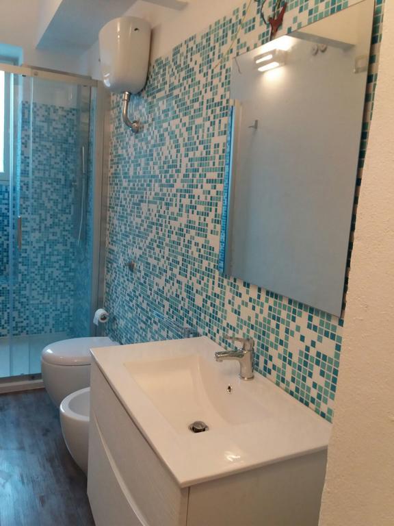 L'Acquario Apartment Cala Gonone Bagian luar foto