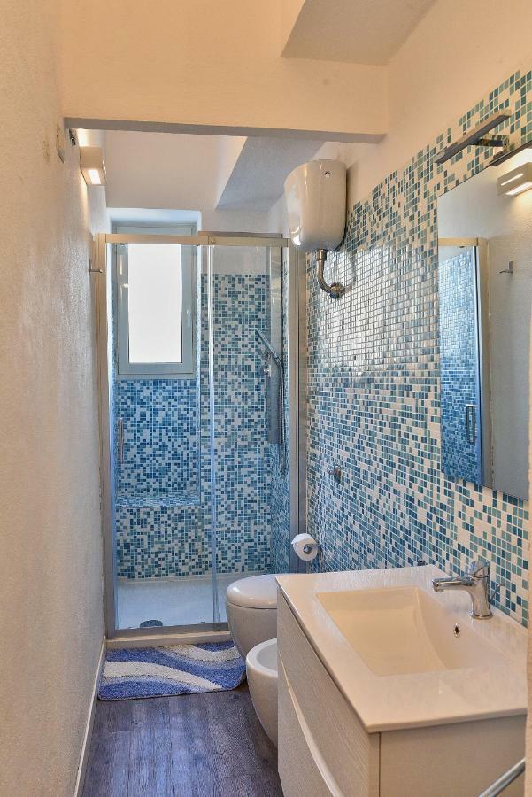 L'Acquario Apartment Cala Gonone Bagian luar foto